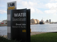 WATER Institute sign with tanker in background